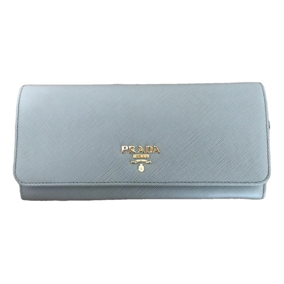 Prada Handbags - PRADA Baby Blue Saffiano Triangle Continental Flap Wallet